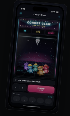 Cohort Claw on a phone: an arcade claw machine full of small colored characters and a pink Drop button.